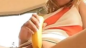 Teenie fucks twat and teases clit with a banana
