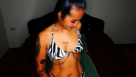 Lily Koh's sensual performance in a bikini