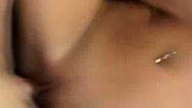 Nikki Benz shows off her big pair while posing with a car