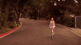 Brunette porn star Tori Black engages in a threesome with two men post-celebration