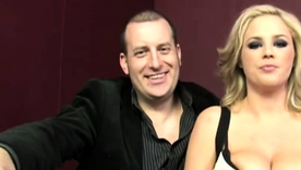 Katie Kox gives a blowjob to a black man while her husband watches