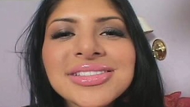 Brunette beauty Sativa Rose in a sensual handjob performance