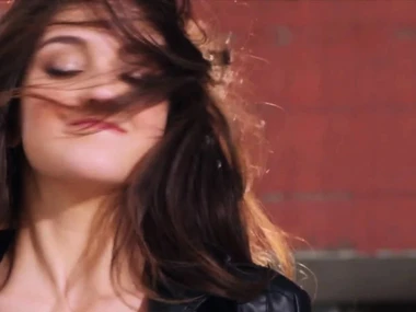 Jaclyn Swedberg, a busty biker vixen, disrobes on a motorcycle in high definition