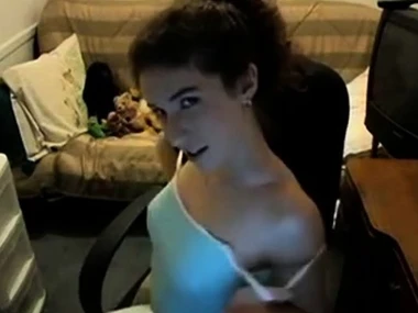 Hairy brunette Sativa Verte bares all in a seductive webcam performance