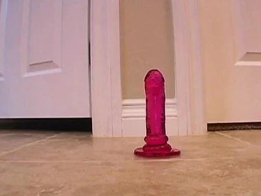 Jamie Lynn's solo represent with a dildo on the floor
