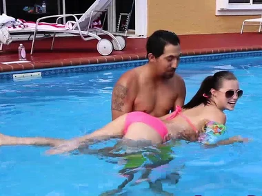 Young and handsome Carolina engages in licentious activities while swimming in a pool