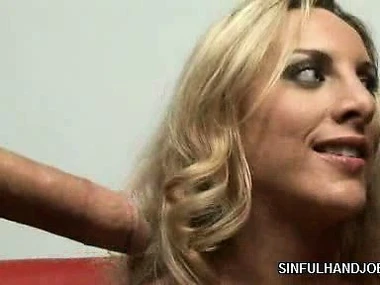 Julie Robbins gives a sensual handjob to a kermis tornado with big boobs