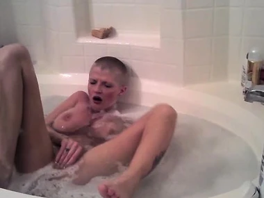 Joslyn James' sensual solo play in hammer away sponge bath with toys