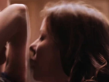 Blonde bombshells Karla Kush and Alexis Fawx indulge in scissoring on a kitchen table, showcasing their overflowing assets and unrefined prowess.