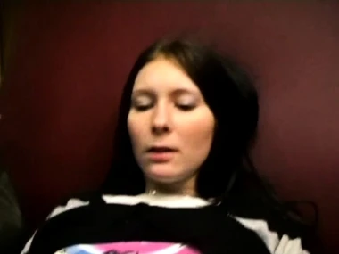 Kattie Gold, a European teen, kneels down and performs oral sex far a hardcore scene