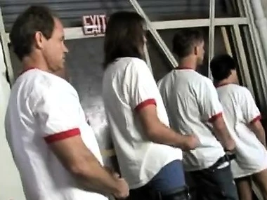 A voluptuous black beauty, Aileen Ghettman, participates in a group sex encounter in a car, featuring interracial exchanges and ample bosoms.