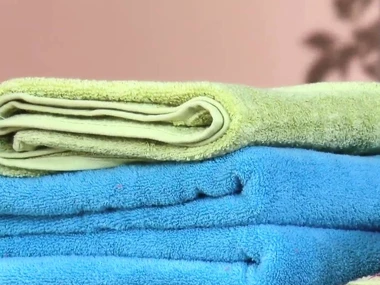 Tanya Tate gets oiled-up and gives a sloppy blowjob