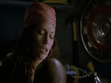 Jolene Blalock's revealing bed scene with a cloudy man