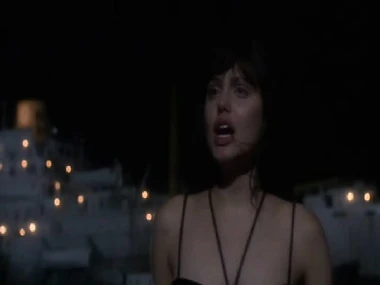 Brunette beauty Angelina Jolie seductively displays her curves in deadly undergarments