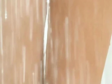 Kelly Brook, a busty British model, poses seductively in a taxi-cub