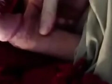 my friends mom plays with my cock as her son is s on the sofa